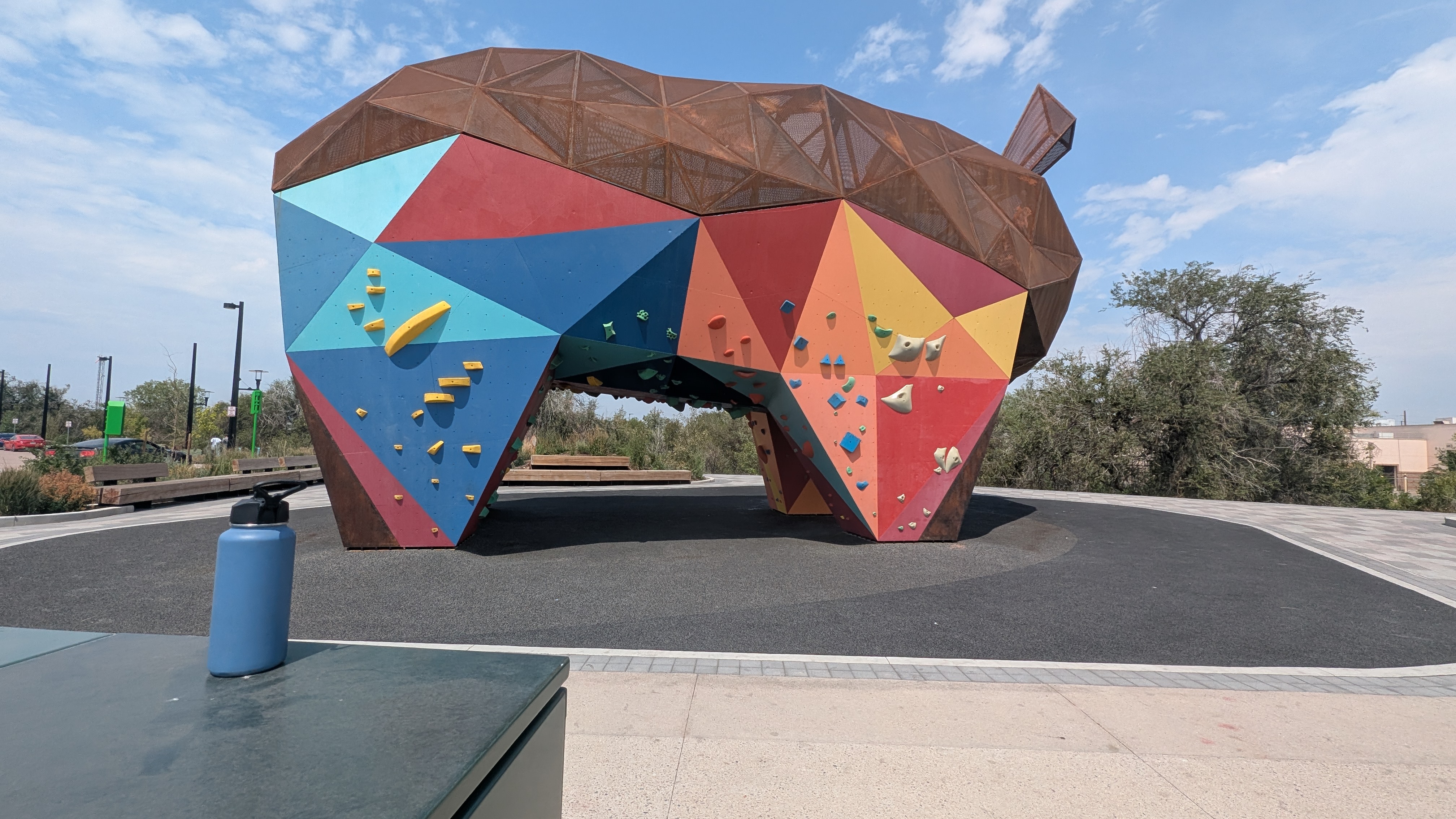 View of the Rhingo climbing structure and surrounding open-space area